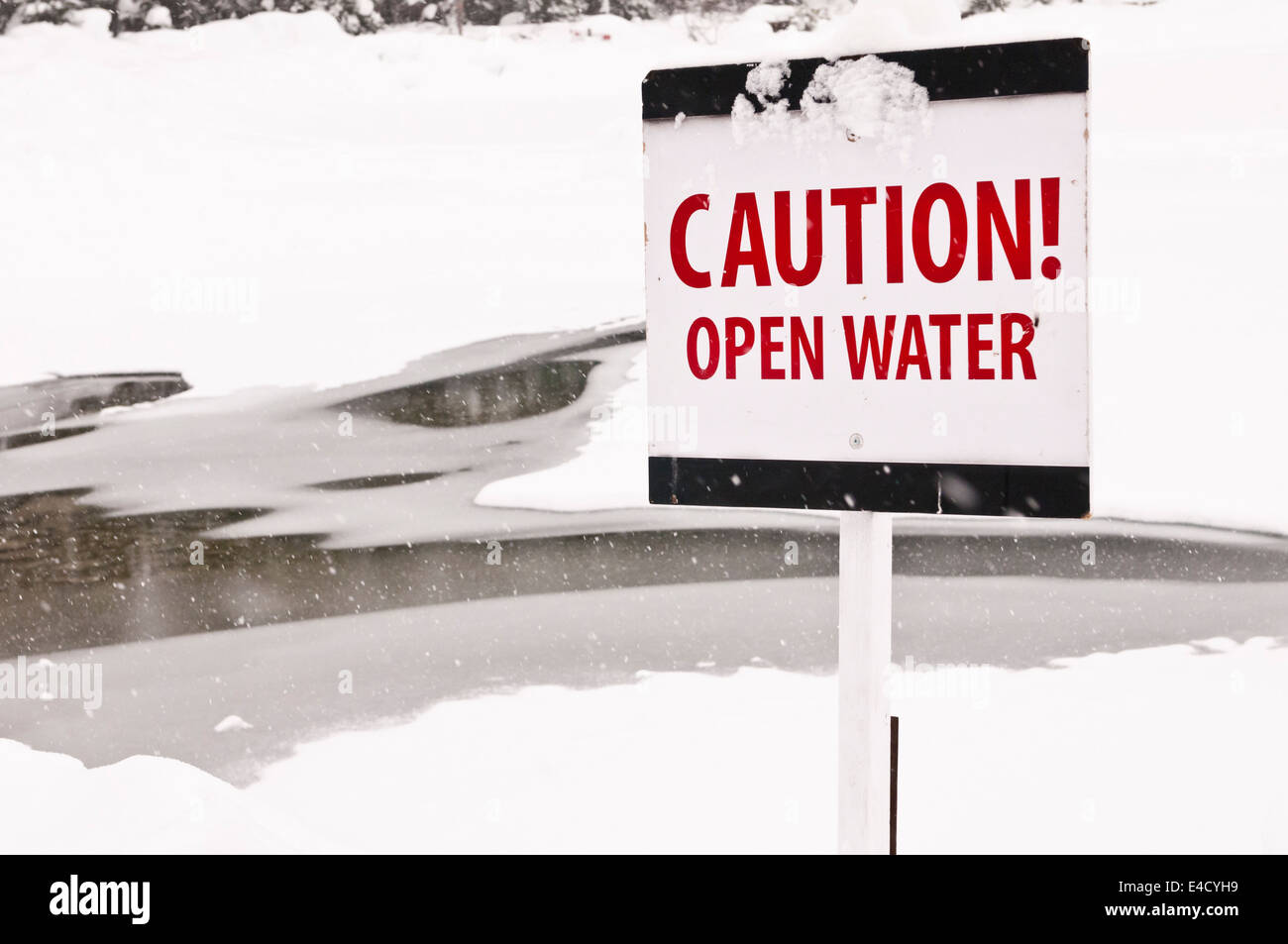 Caution Open Water, sign, Lake Louise, Banff National Park, Alberta, Canada Stock Photo