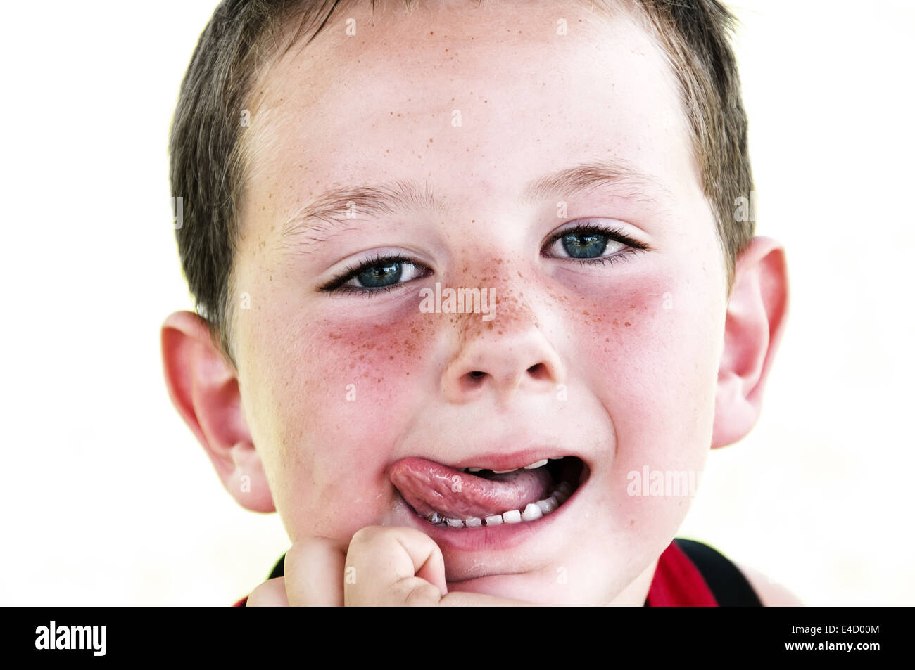 Cute little boy being playful and making funny faces Stock Photo