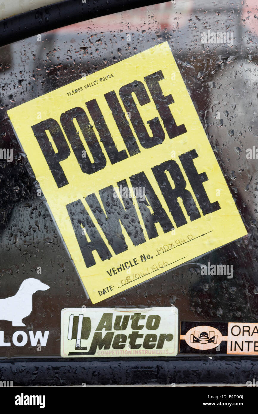 Police aware Sticker on car window Stock Photo