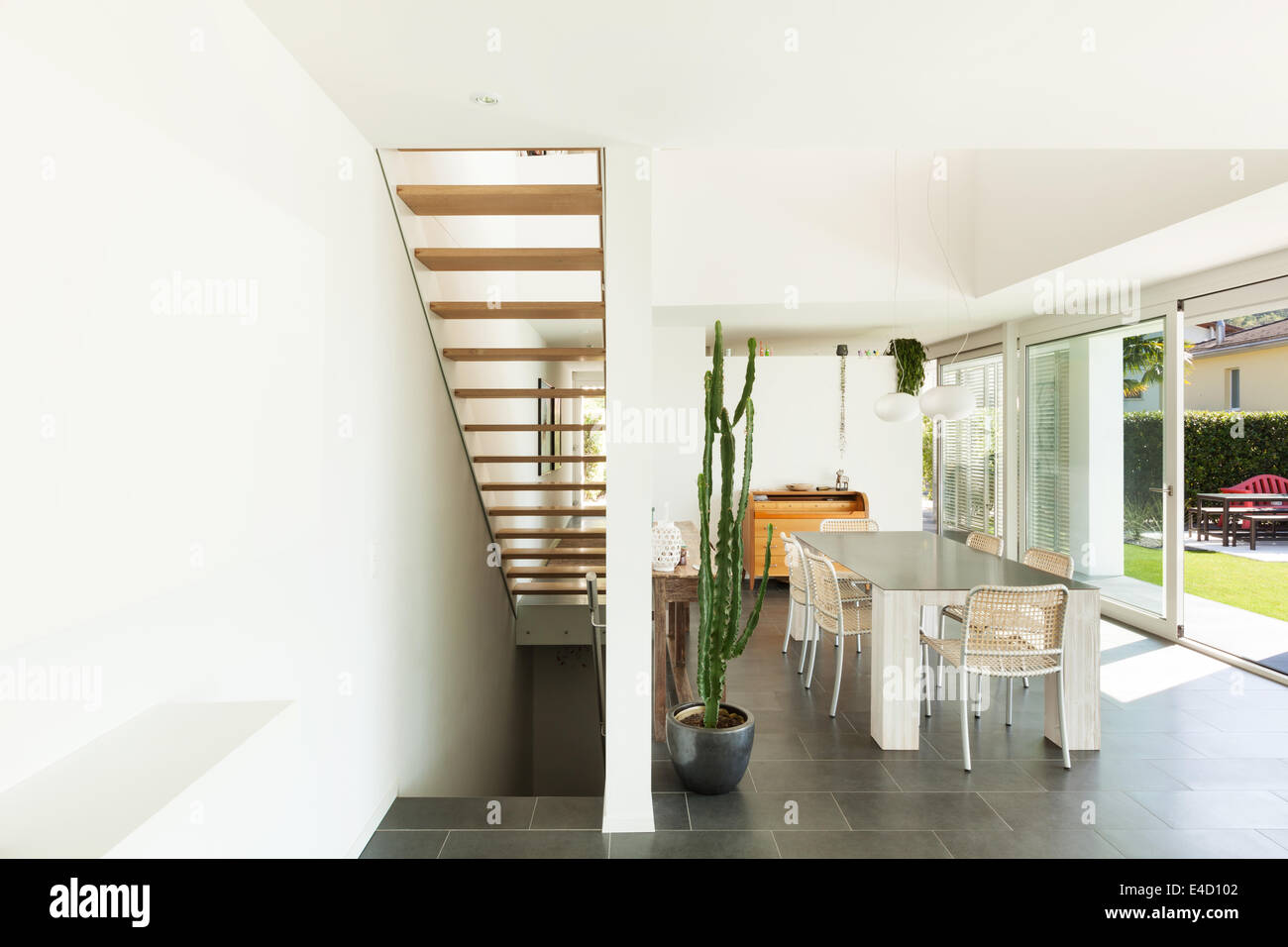 Modern villa, interior, wide dining room Stock Photo - Alamy