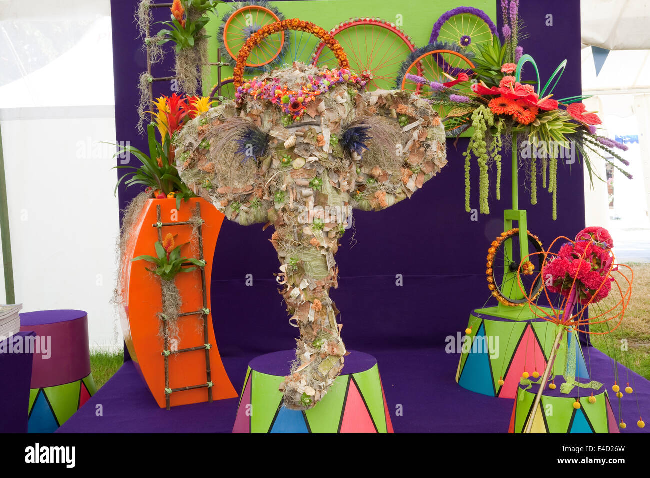 Hampton Court, UK. 8th July, 2014. An elephant made of flowers for a Circus  theme in, image size:1300x956