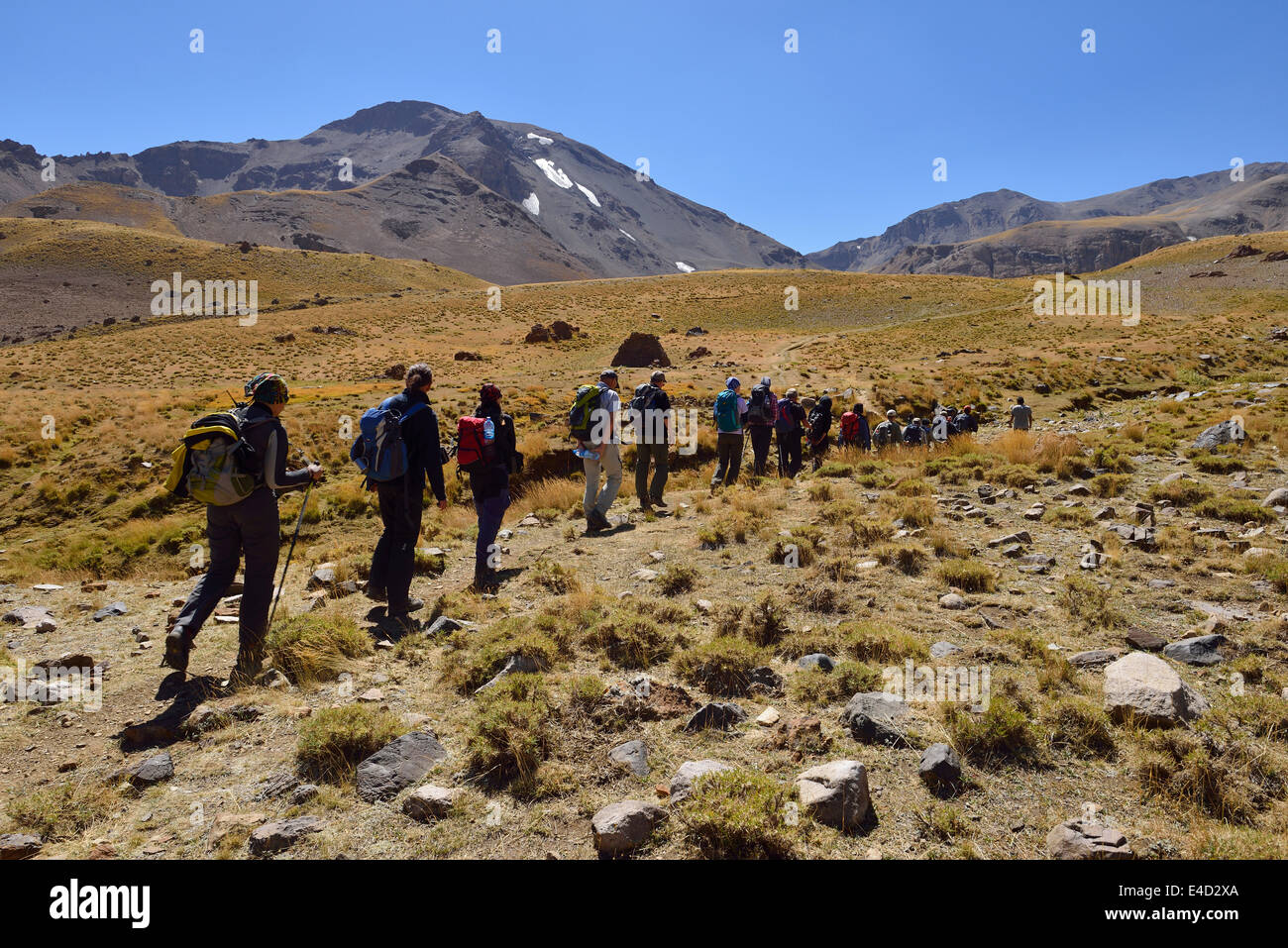 Group of people hiking on Hesarshal plateau, Takht-e Suleyman Massif, Alborz Mountains, Mazandaran Province, Persia, Iran Stock Photo