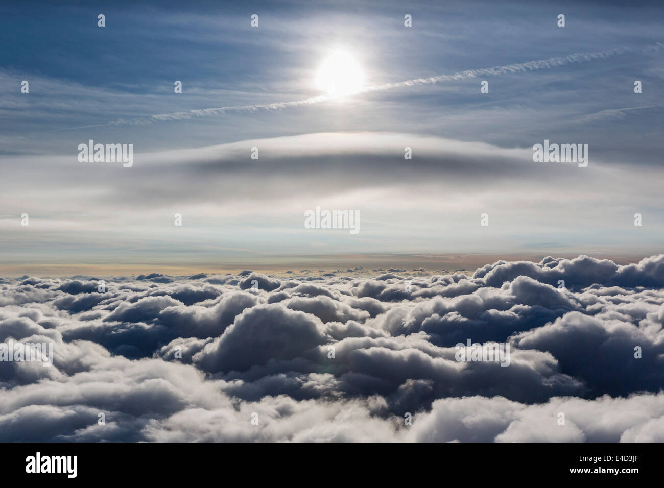 Lenticular cloud, Cumulus lenticularis, above the top layer of clouds, North Rhine-Westphalia, Germany Stock Photo