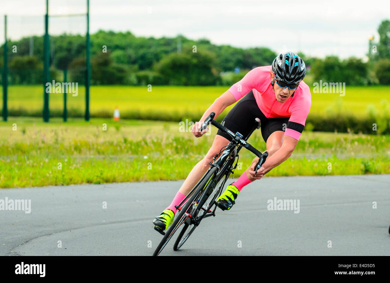 Cyclist racing in criterium event on dedicated cycle circuit at York Sport Village York Yorkshire Stock Photo