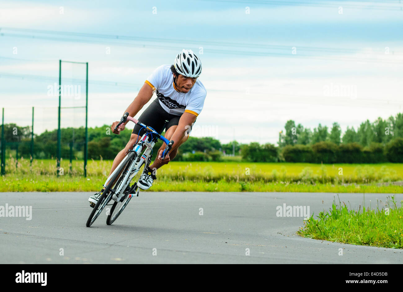 Cyclist racing in criterium event on dedicated cycle circuit at York Sport Village York Yorkshire Stock Photo