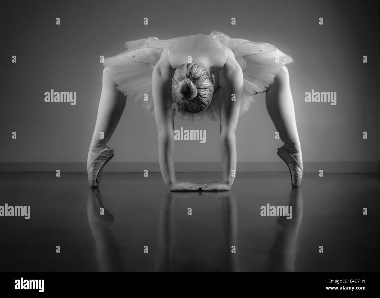 Graceful young woman in white Black and White Stock Photos & Images - Alamy