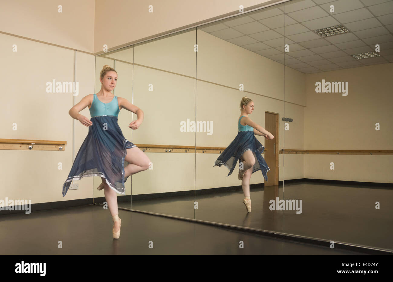 Beautiful ballerina dancing in front of mirror Stock Photo Alamy