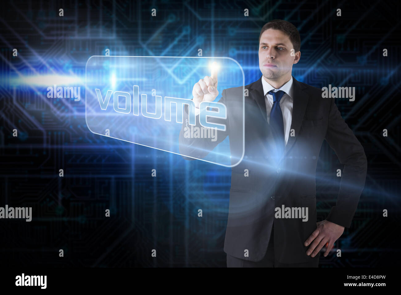 Businessman pointing to word volume Stock Photo