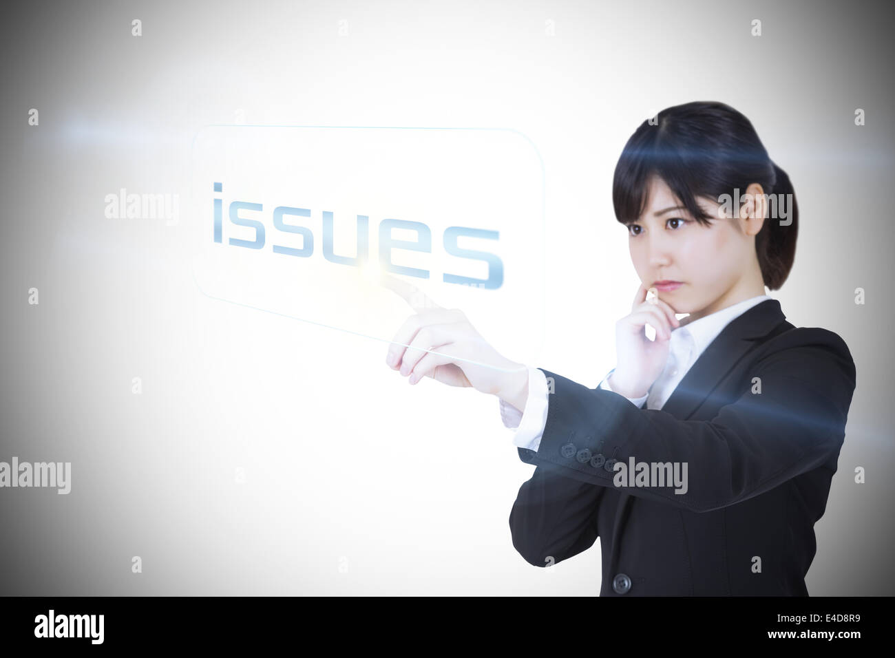 Businesswoman pointing to word issues Stock Photo