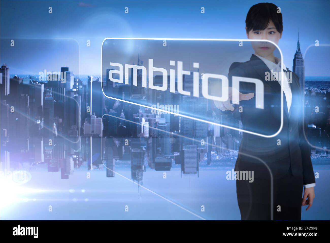 Businesswoman pointing to the word ambition Stock Photo