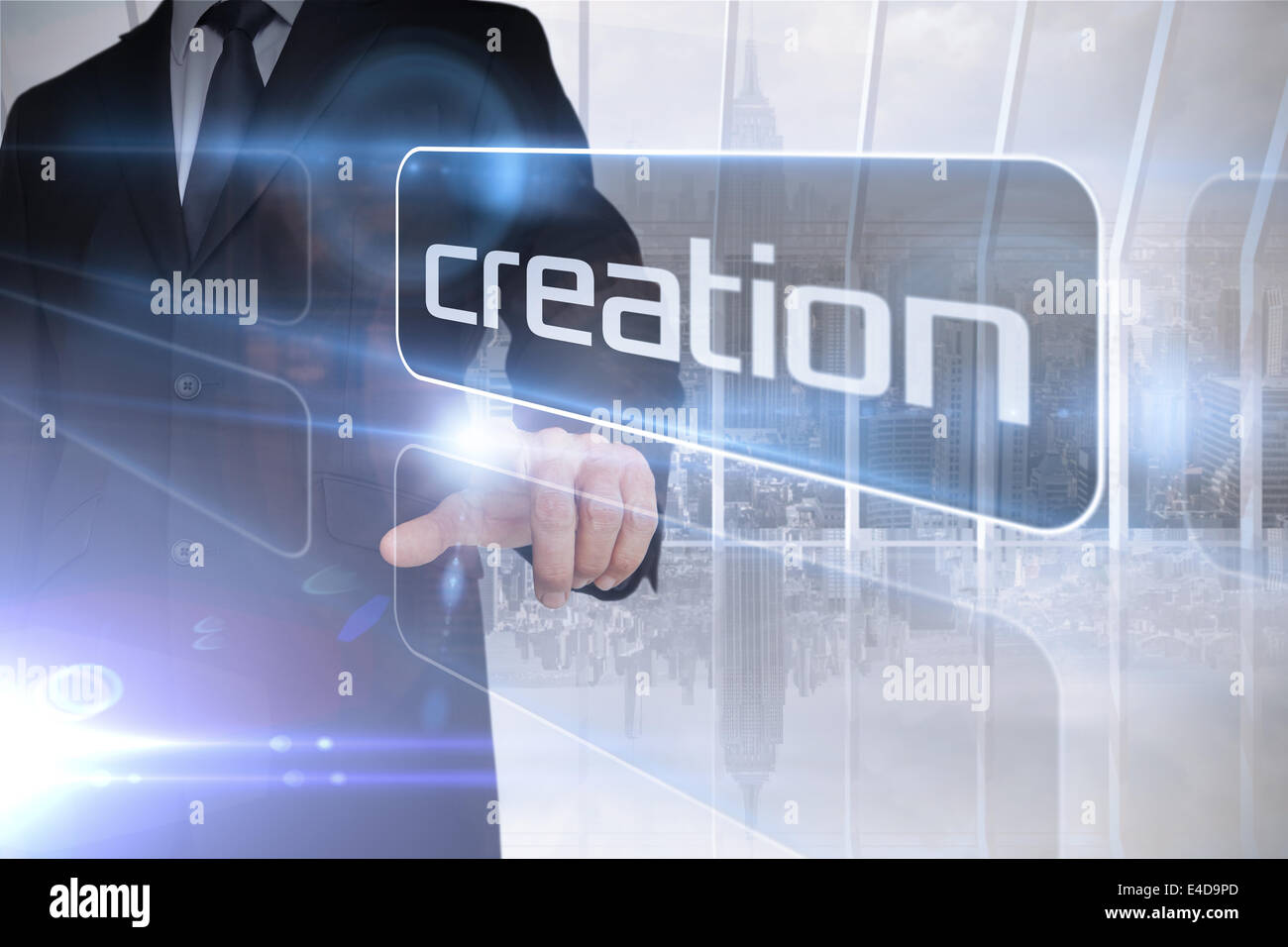 Businessman presenting the word creation Stock Photo