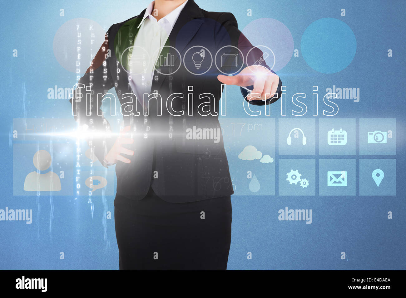 Businesswoman touching the words financial crisis on interface Stock Photo