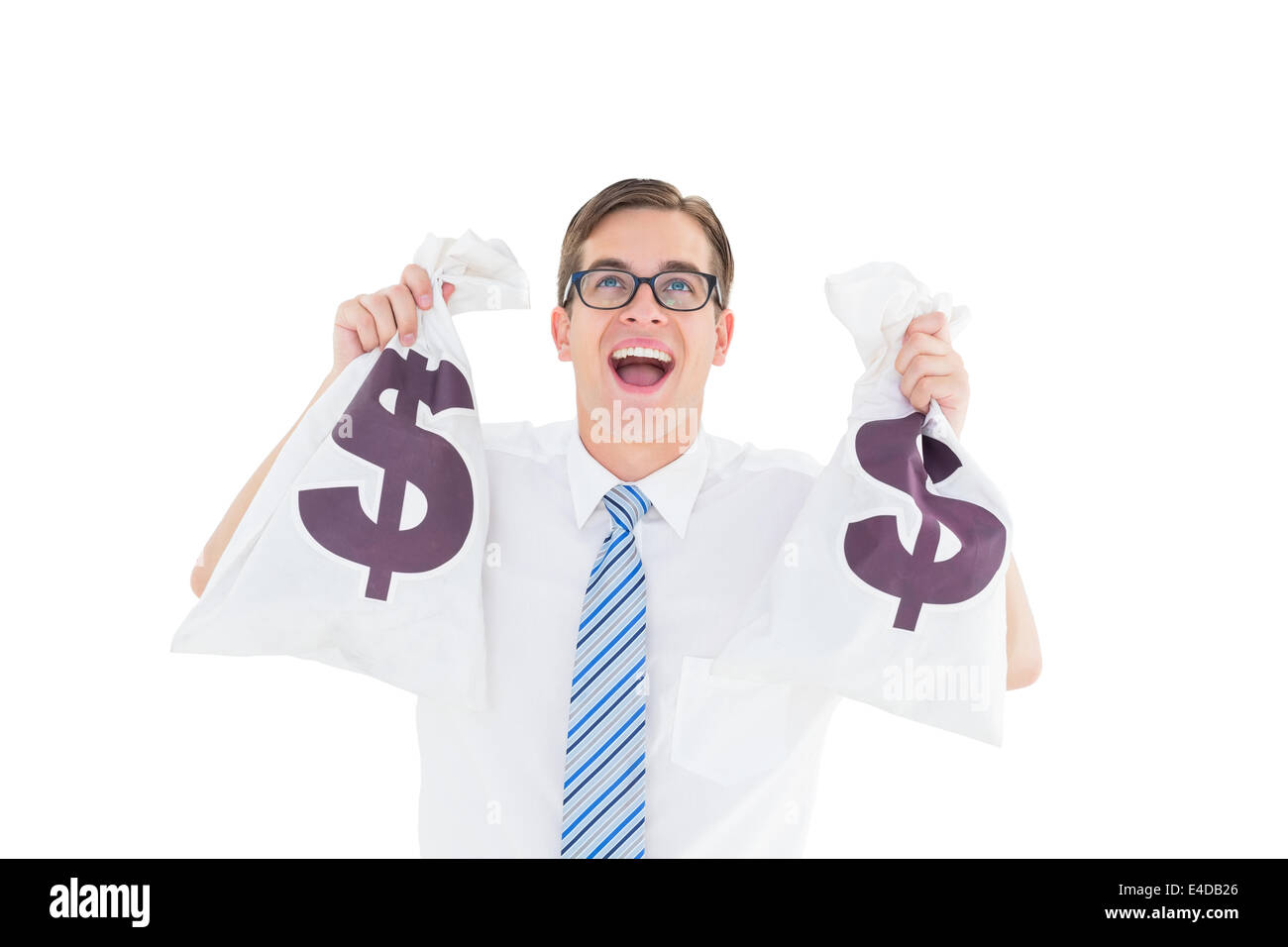 Geeky happy businessman holding bags of money Stock Photo