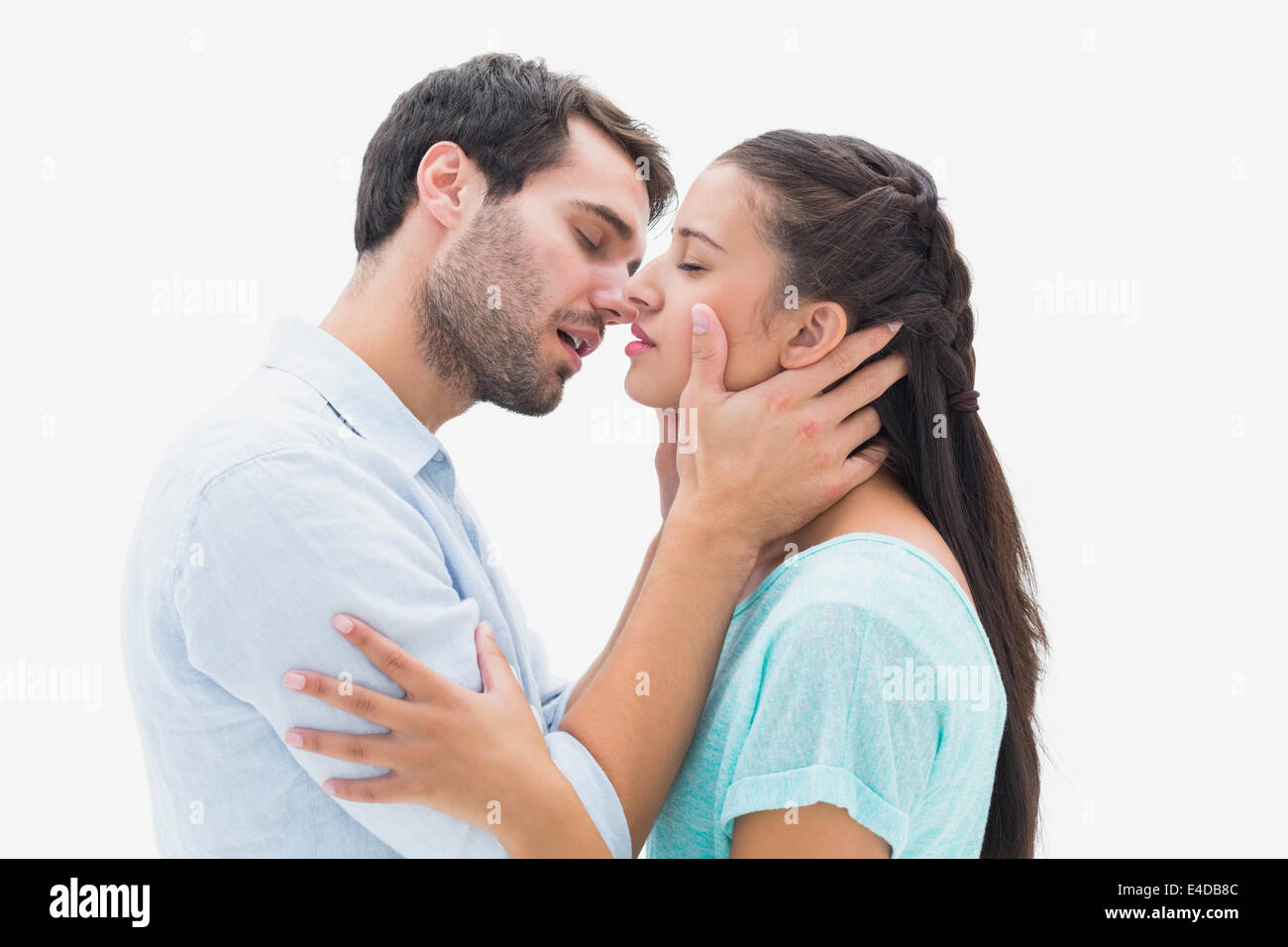 Attractive young couple about to kiss Stock Photo