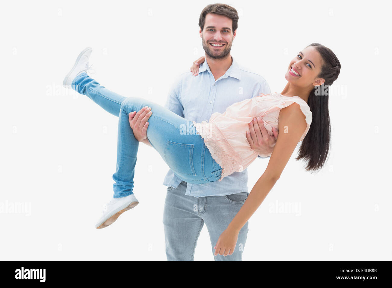 Attractive young couple having fun Stock Photo - Alamy
