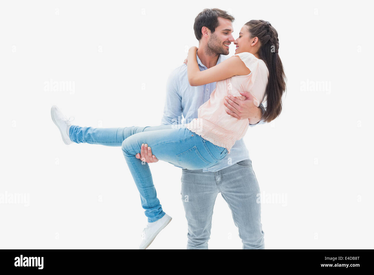 Attractive young couple having fun Stock Photo - Alamy