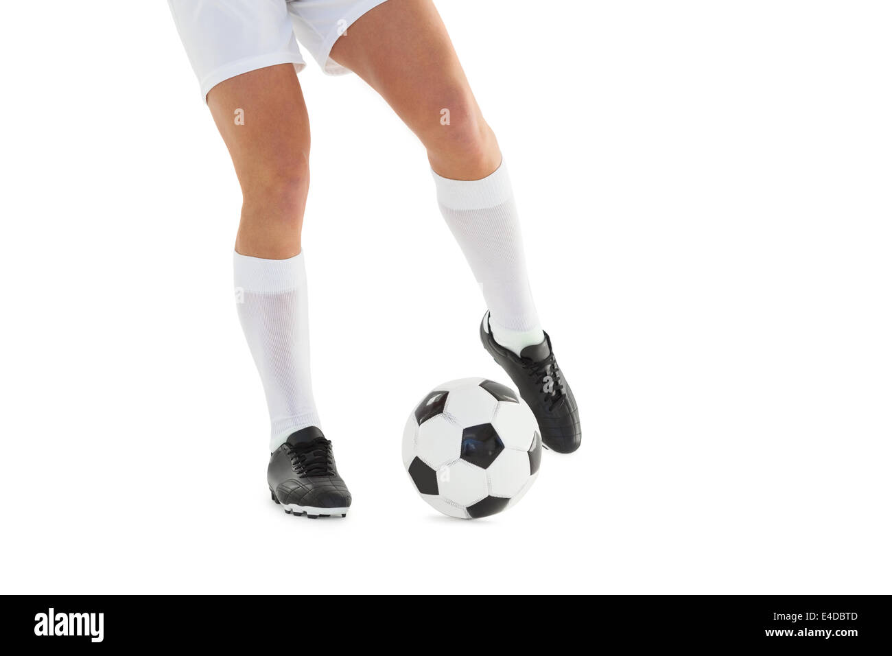 Football player kicking the ball Stock Photo Alamy