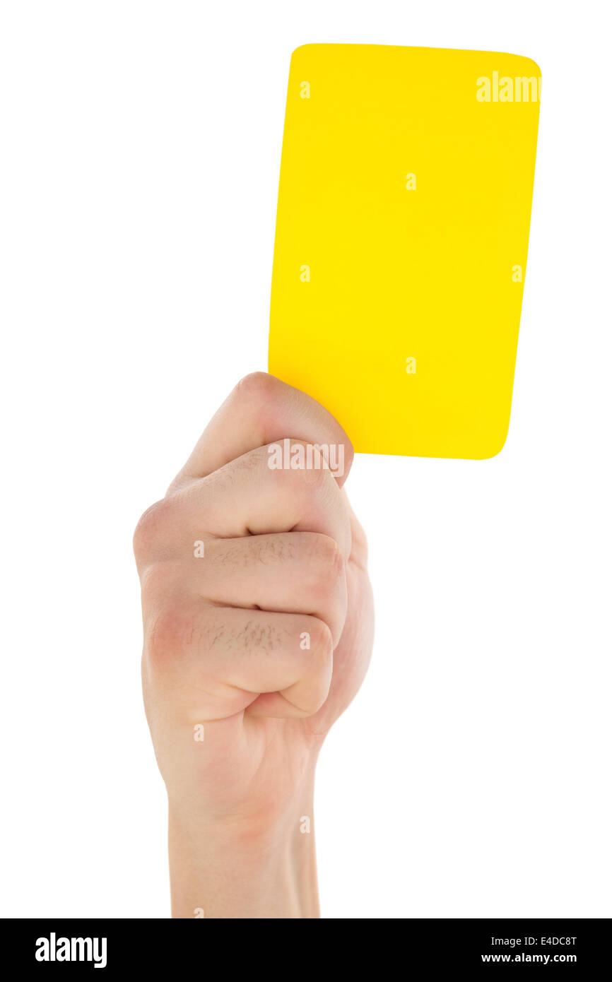 Hand holding yellow card up Stock Photo Alamy