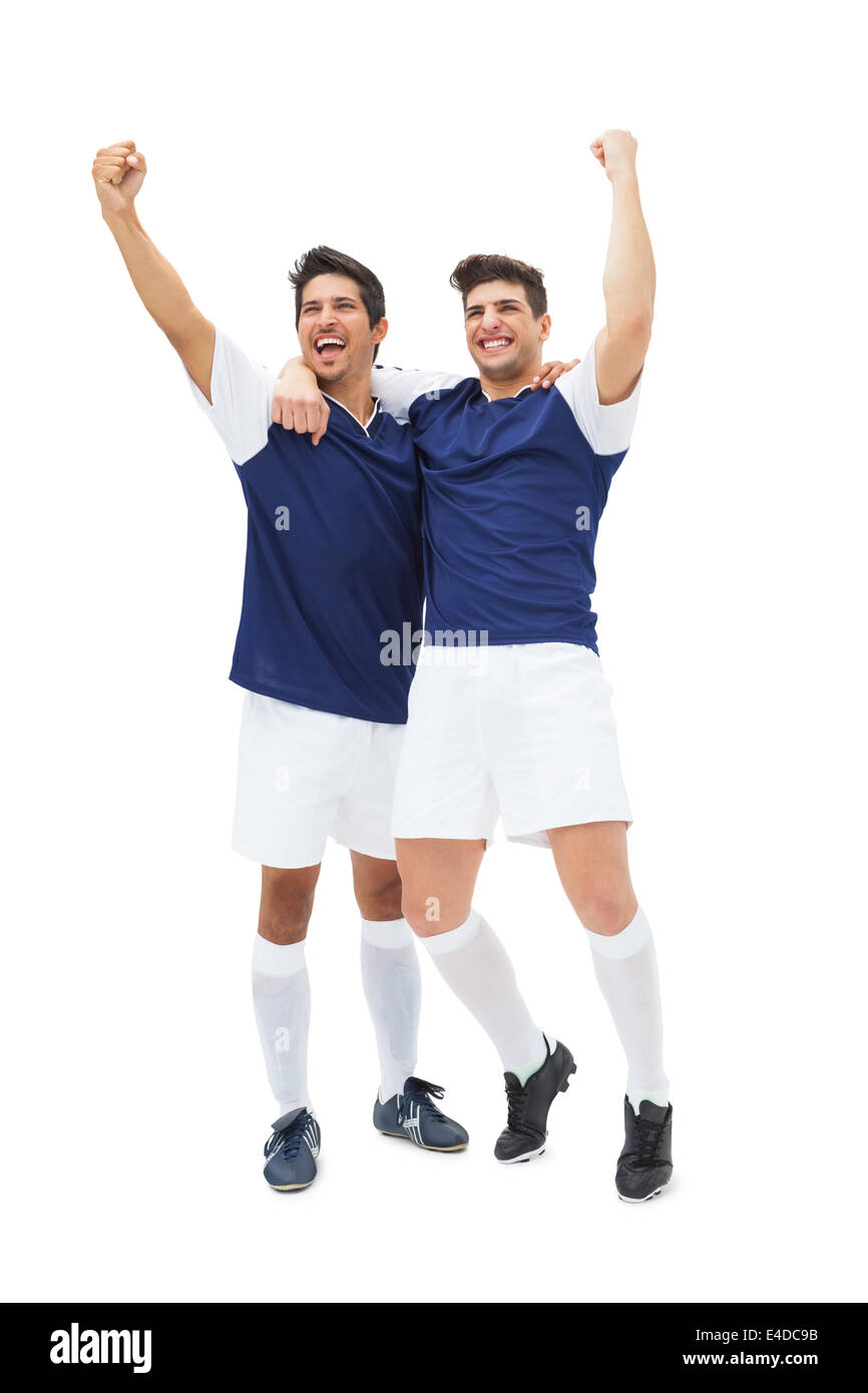 Football players celebrating a win Stock Photo Alamy
