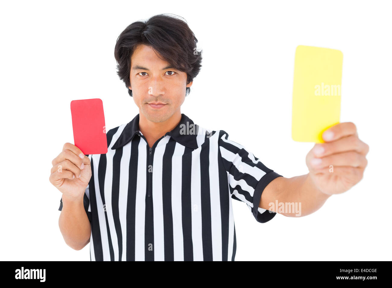 Stern referee showing yellow card Stock Photo