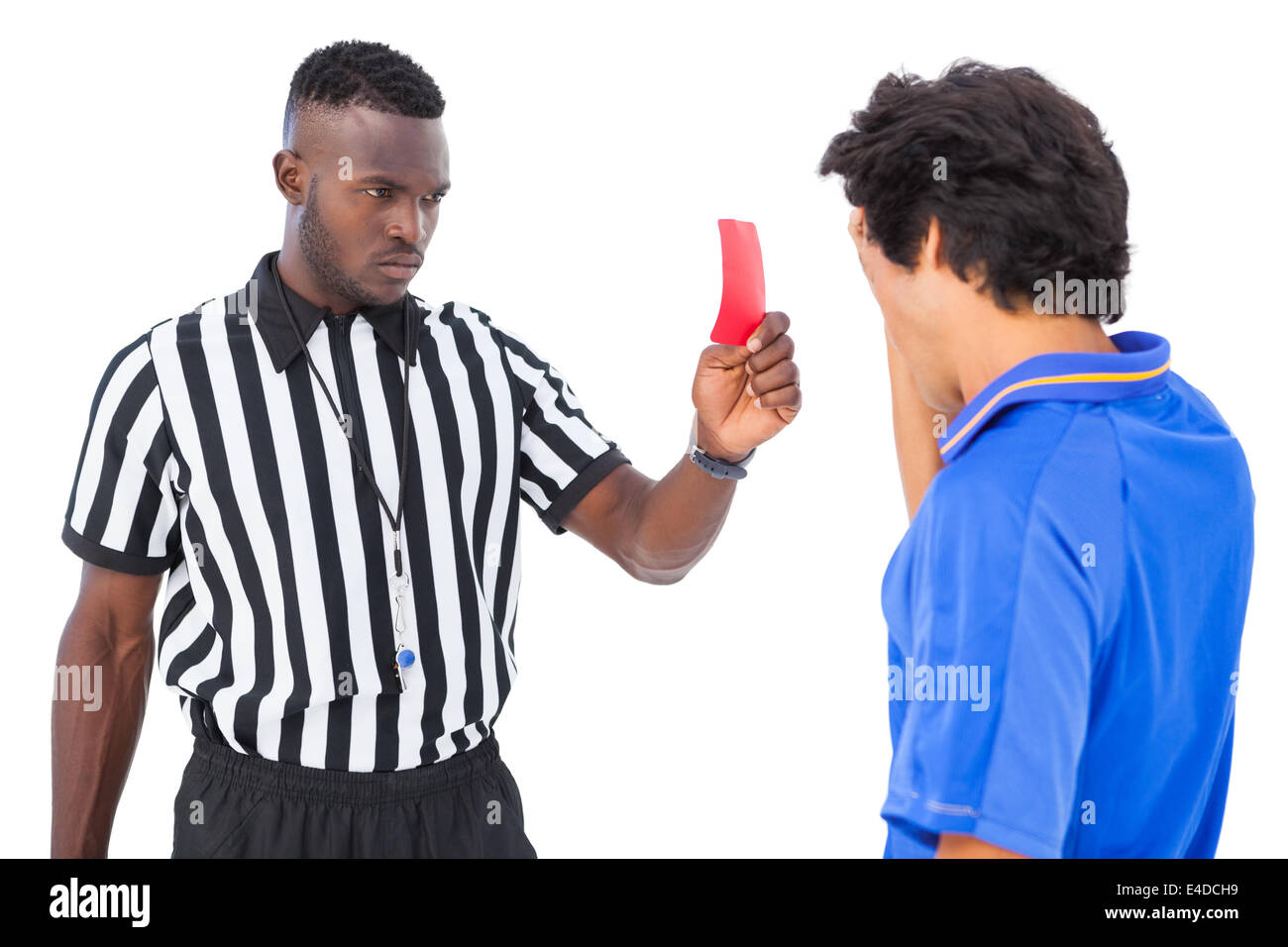 Referee sending off football player Stock Photo