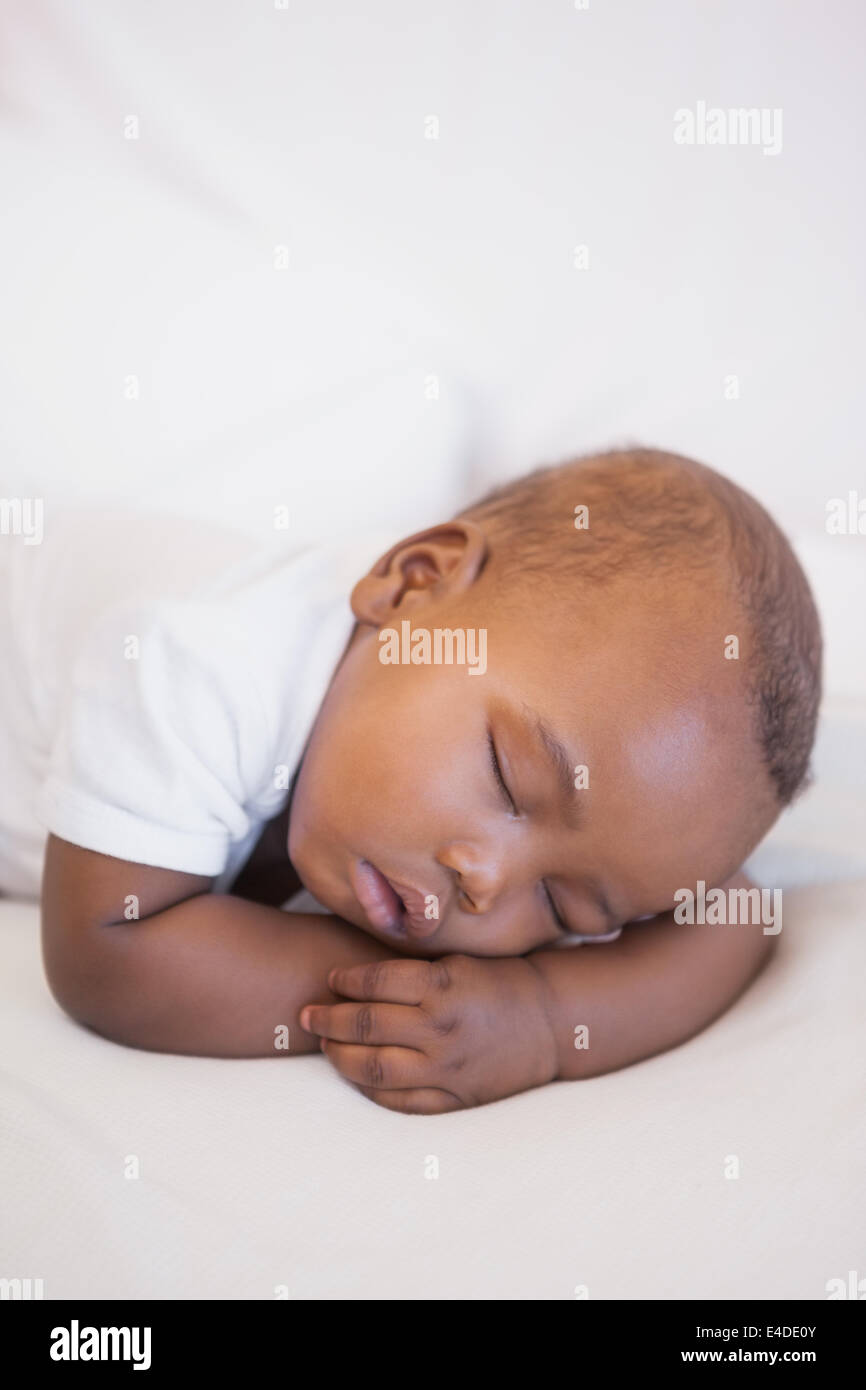 Baby boy sleeping peacefully on couch Stock Photo