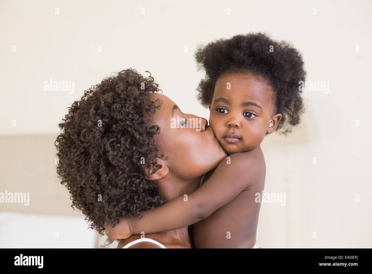 Happy mother with her baby girl Stock Photo