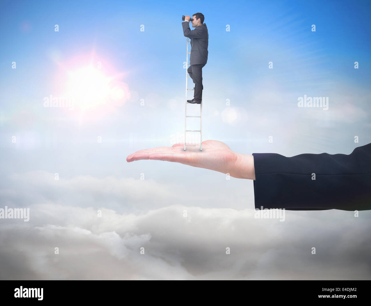 Composite image of businessman standing on ladder Stock Photo - Alamy