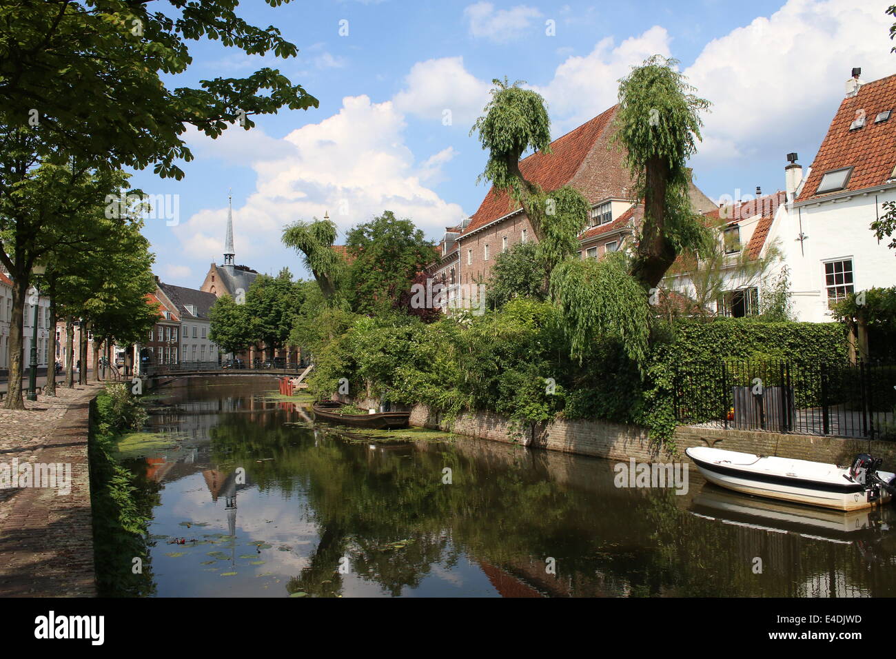 Picturesque Westsingel canal in the medieval inner city of Amersfoort, The Netherlands in summer with reflections Stock Photo