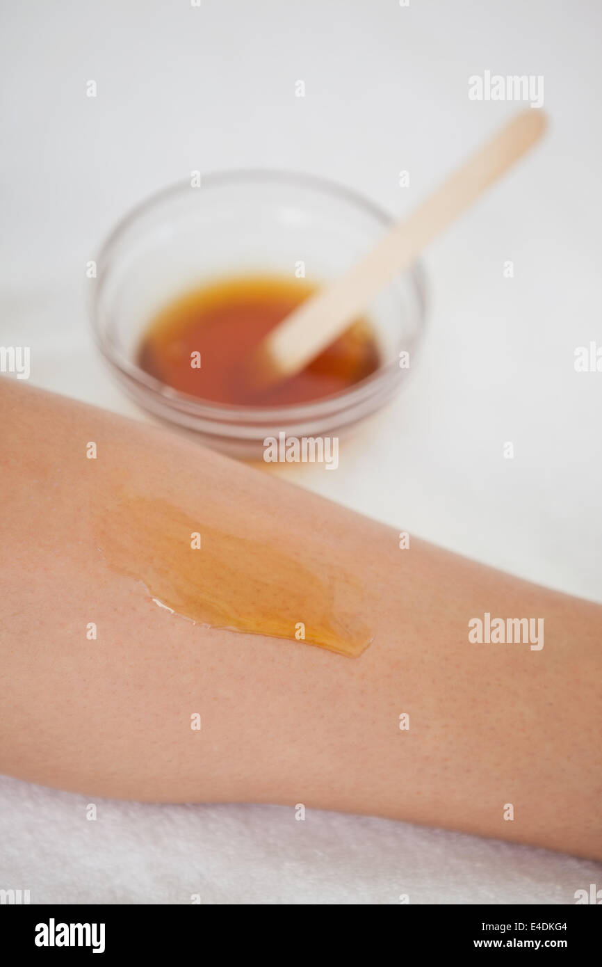 Womans leg with hot wax on it Stock Photo Alamy