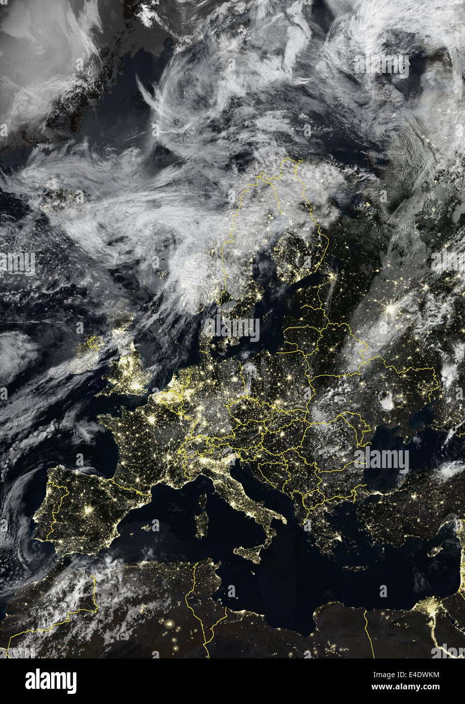 Europe At Night With Country Borders And Cloud Coverage, True Colour Satellite Image. True colour satellite image of Europe at n Stock Photo