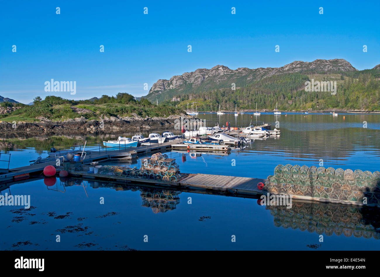 boats-moored-and-lobster-creels-stacked-on-jetties-at-plockton-harbour