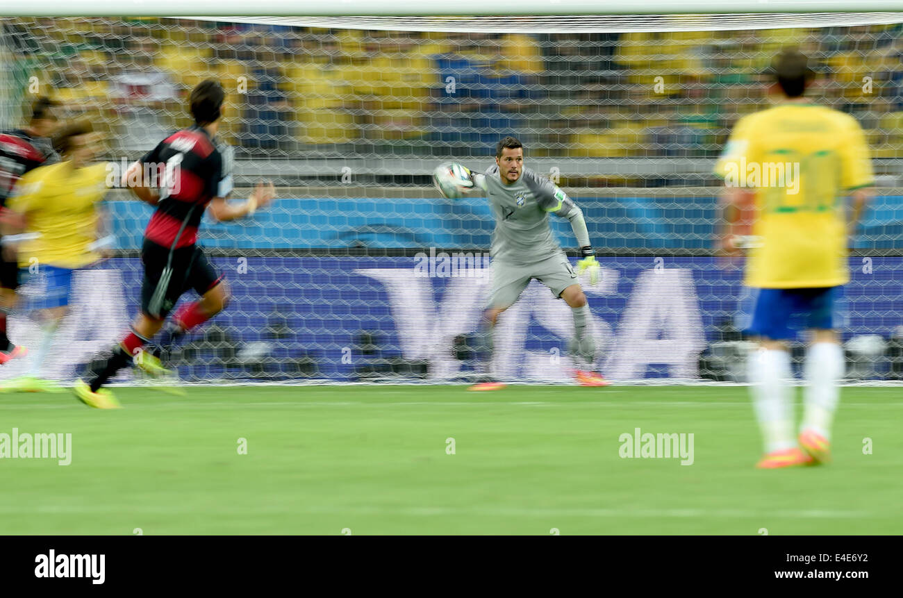 Belo Horizonte, Brazil. 08th July, 2014. Brazil's goal keeper Julio Cesar throws the ball during the FIFA World Cup 2014 semi-final soccer match between Brazil and Germany at Estadio Mineirao in Belo Horizonte, Brazil, 08 July 2014. Photo: Marcus Brandt/dpa/Alamy Live News Stock Photo