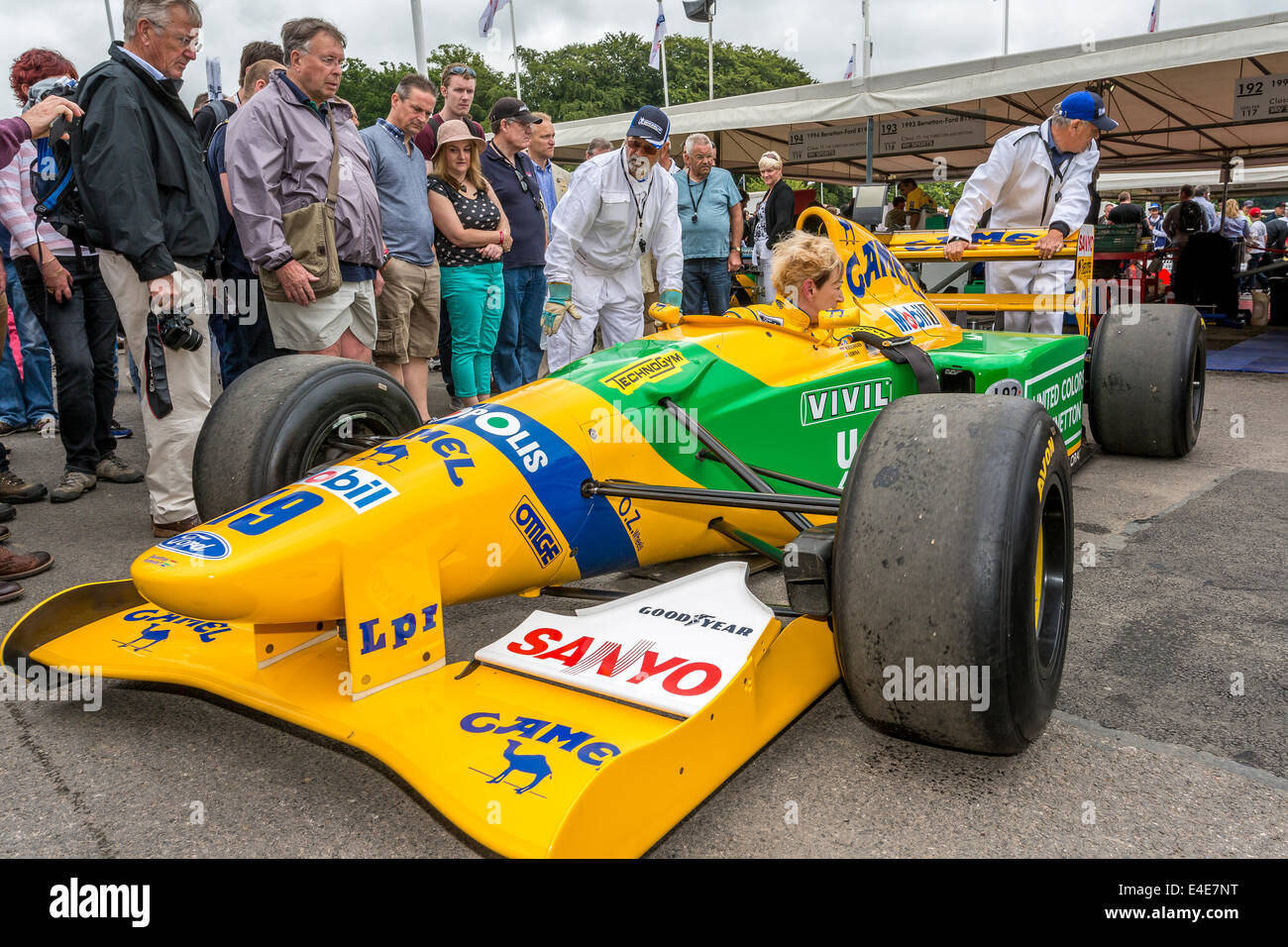 1992 Benetton-Ford B192 in the paddock with driver Lorina McLaughlin. 2014 Goodwood Festival of Speed, Sussex, UK. Stock Photo