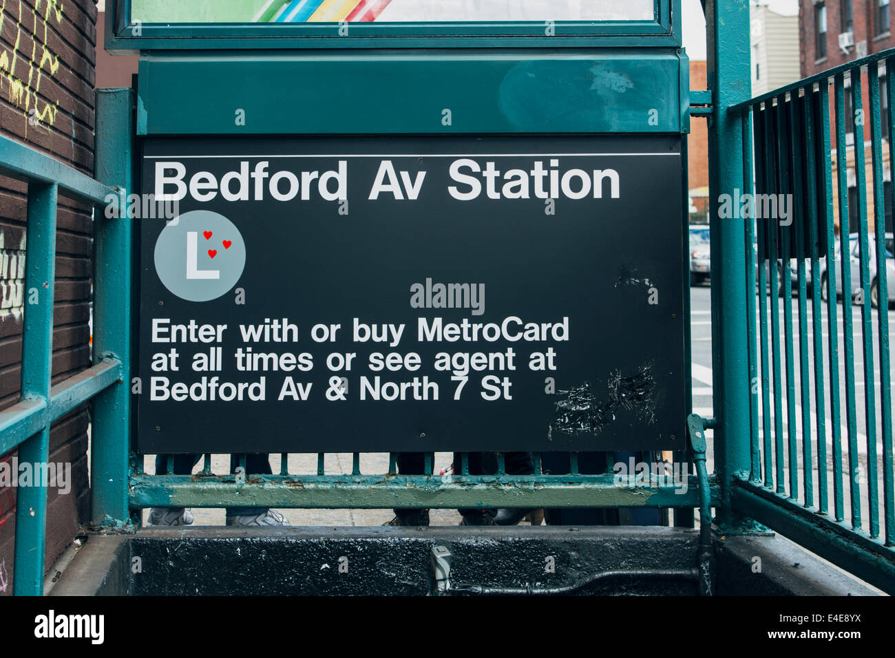 Bedford Avenue subway sign with hearts graffiti. Williamsburg, Brooklyn. New York City, NY, USA. Stock Photo