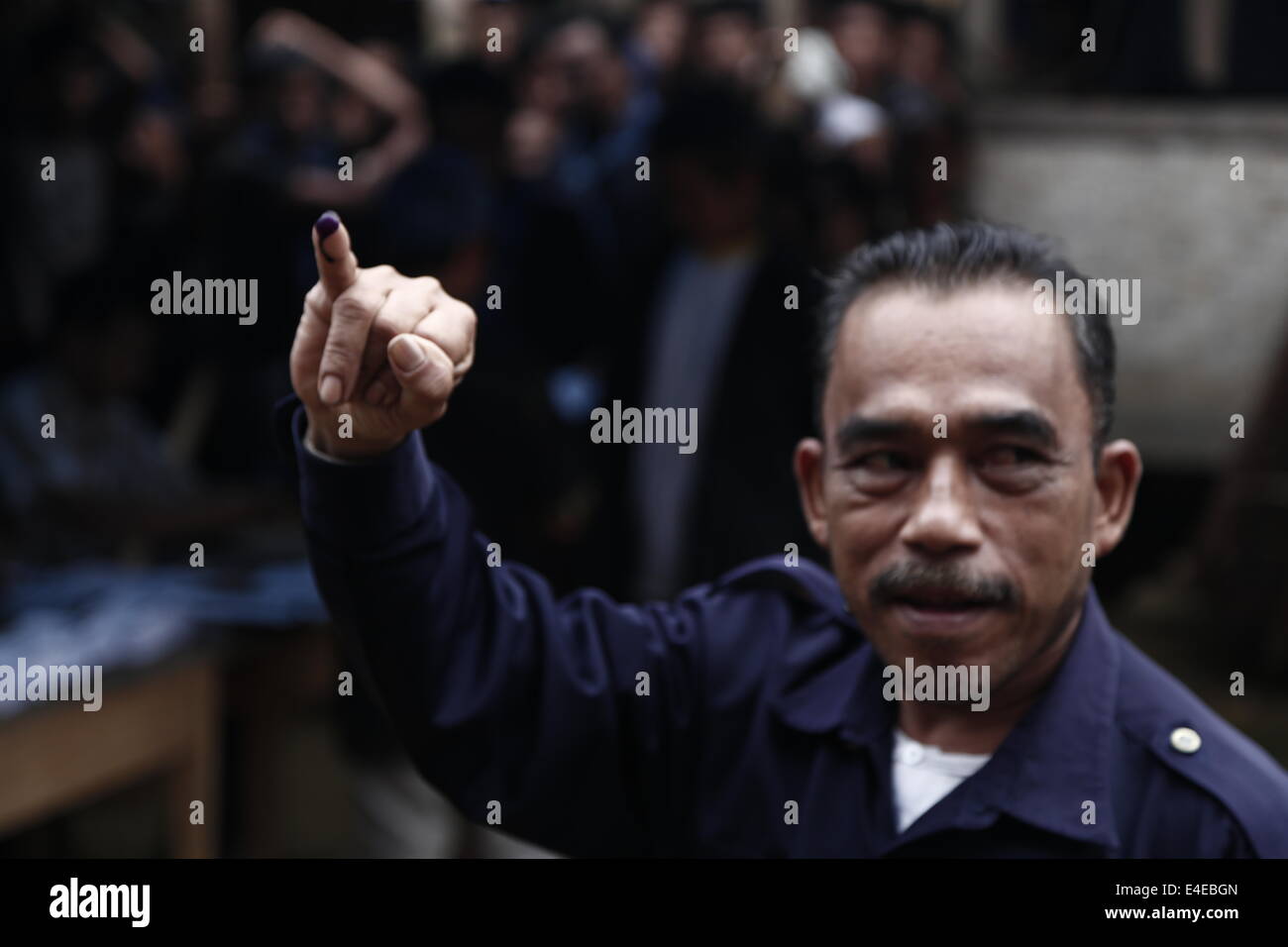 July 9, 2014 - Leader of Baduy Tribe show prove of his finger inked after giving vote © Donal Husni/NurPhoto/ZUMA Wire/Alamy Live News Stock Photo