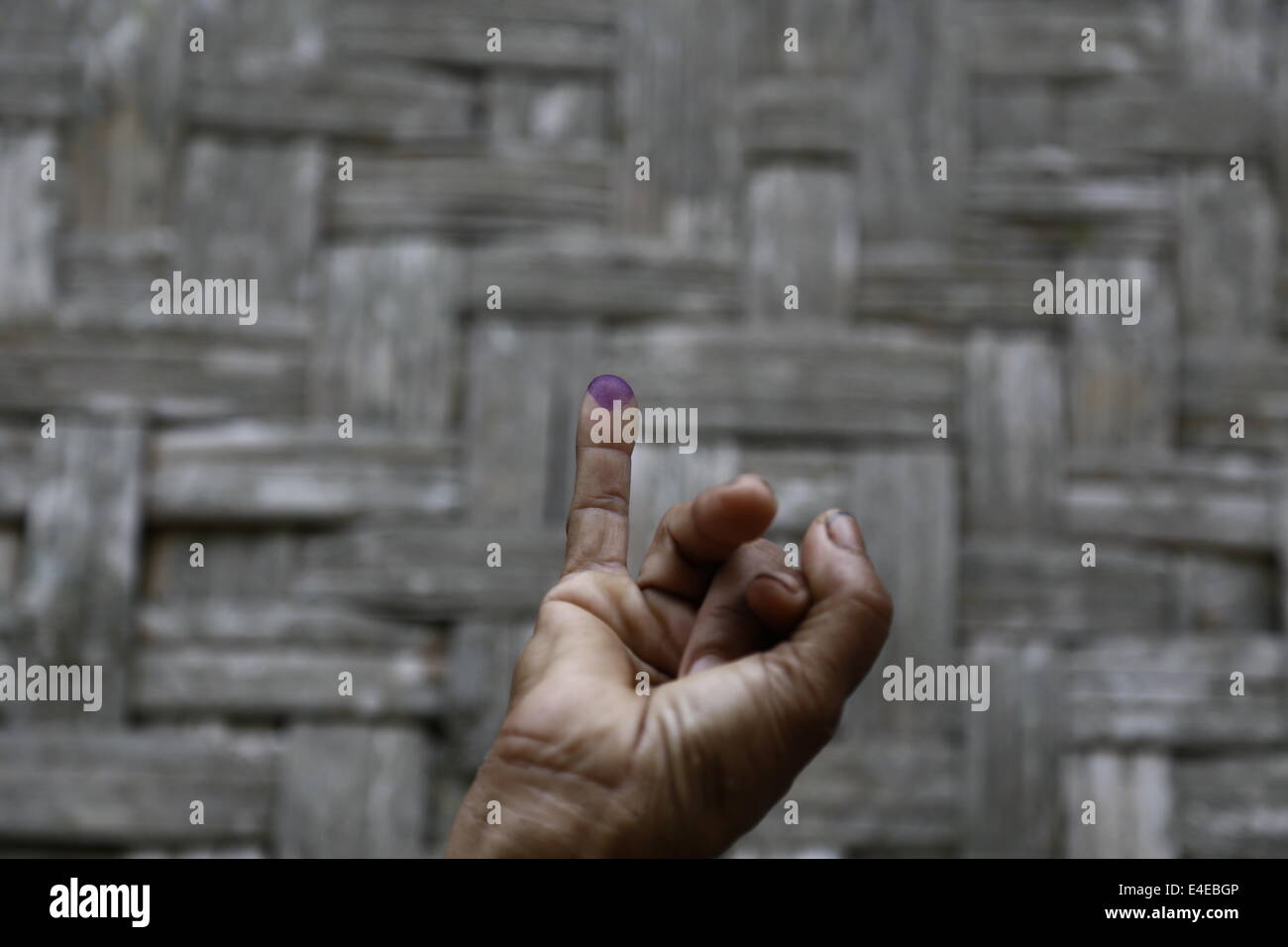 July 9, 2014 - Old lady show his finger as prove for the election © Donal Husni/NurPhoto/ZUMA Wire/Alamy Live News Stock Photo