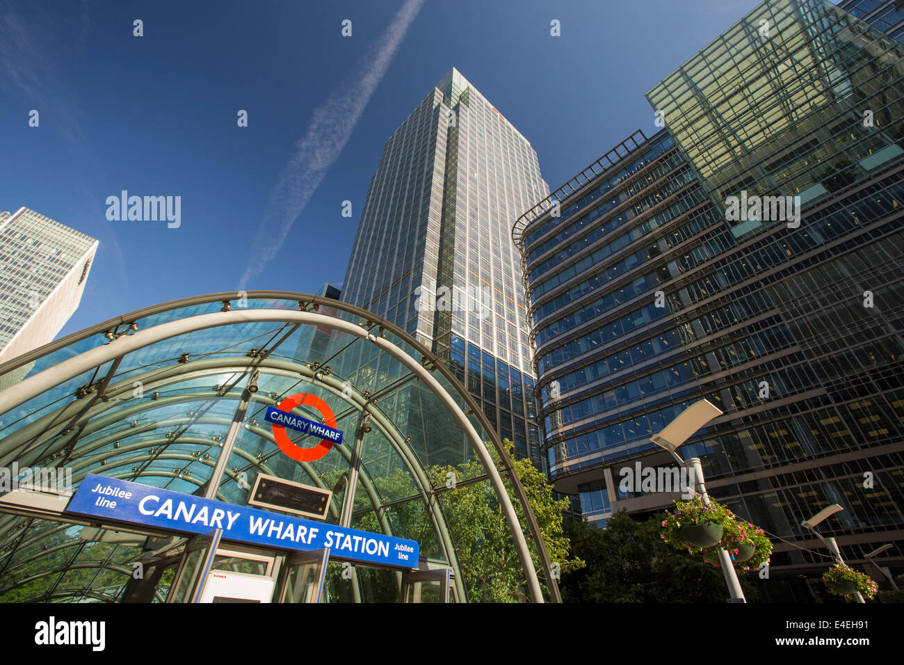 Banks in Canary Wharf, London, UK and the Canary Wharf Docklands Light Railway station. Stock Photo