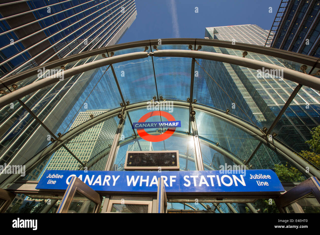 Banks in Canary Wharf, London, UK and the Canary Wharf Docklands Light Railway station. Stock Photo
