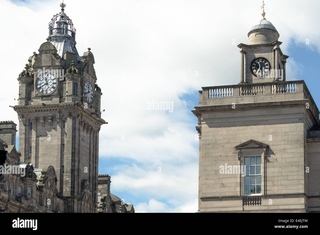 Clock towers of the National Archives and the Balmoral in Edinburgh