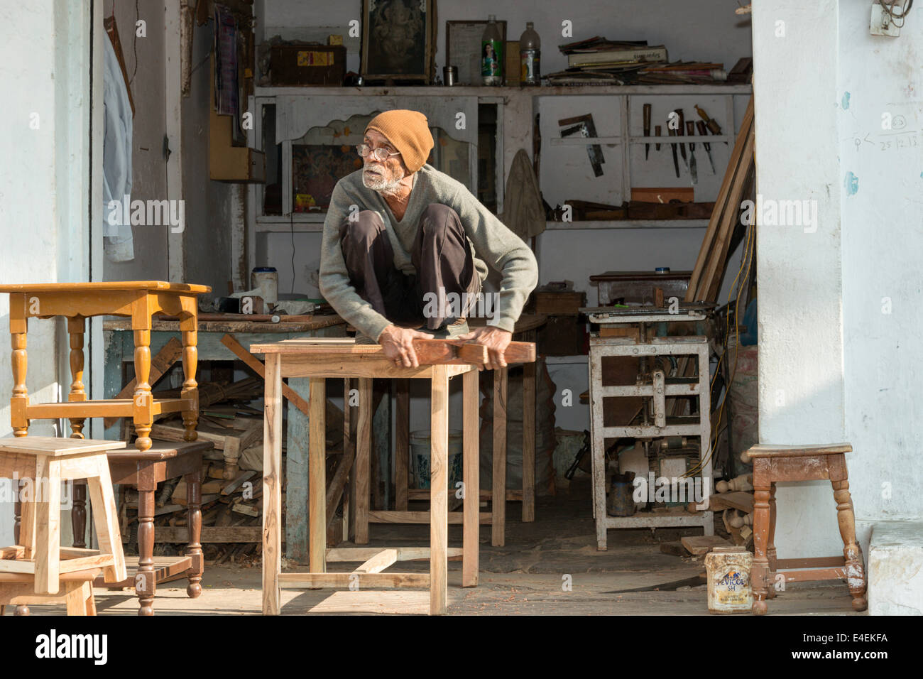 UDAIPUR, INDIA JANUARY 2014 A carpenter working on furniture in