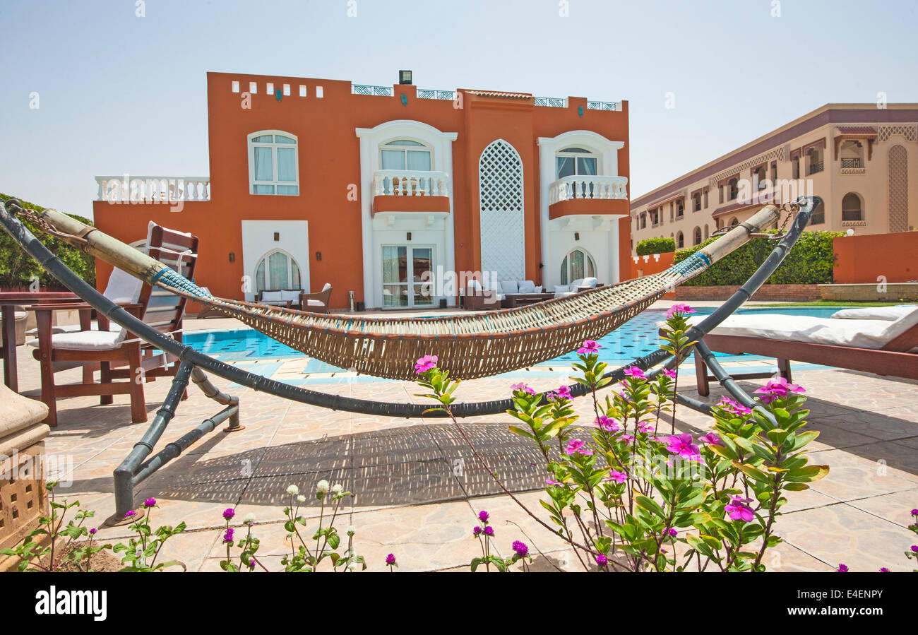 Picture of Exterior of luxury villa with swimming pool in tropical resort Stock ...