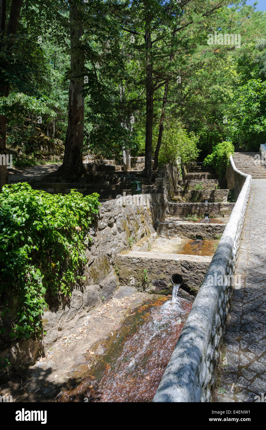 Stream with water running down the mountain at the Villa Termal das Caldas de Monchique spa resort in the Algarve Stock Photo