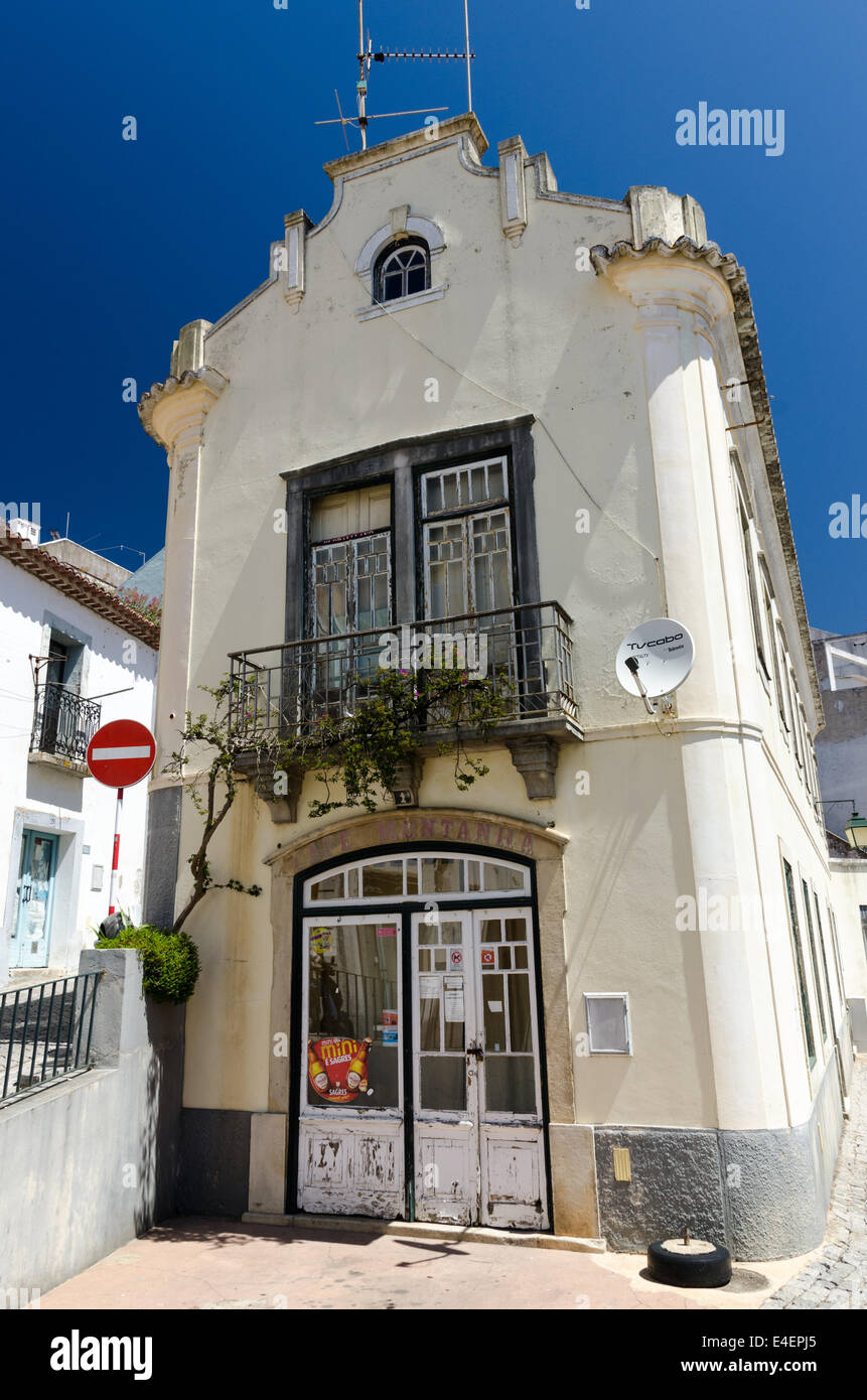 An old white-washed building in the pretty town of Monchique in the Serra de Monchique, Portugal Stock Photo