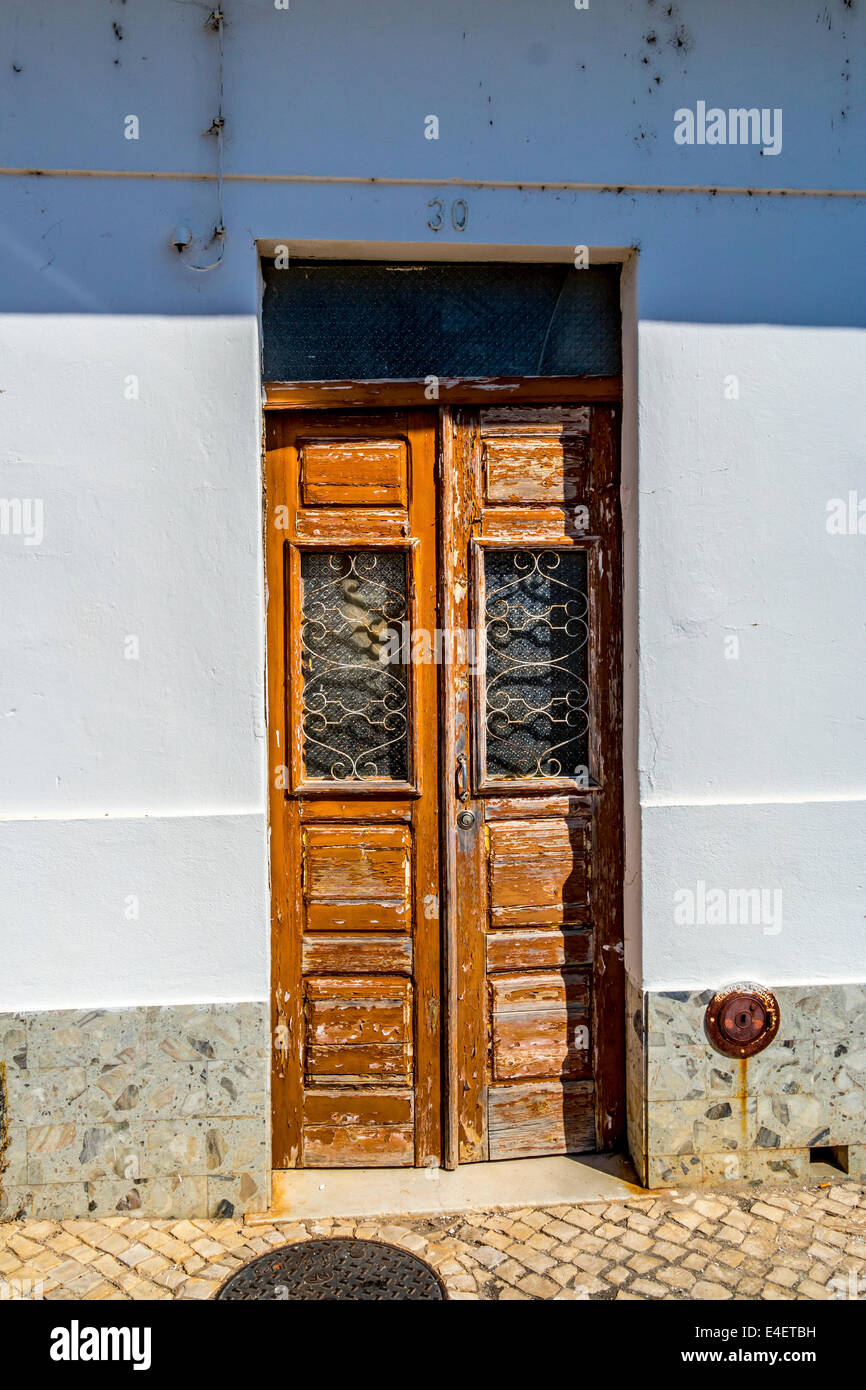 Weather beaten brown door, Stock Photo