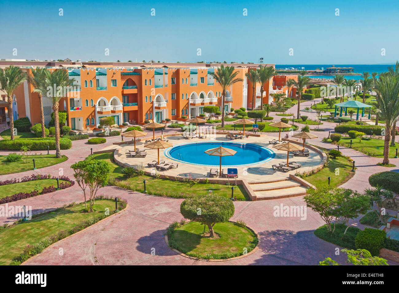 Aerial view of tropical hotel resort with swimming pool Stock Photo - Alamy