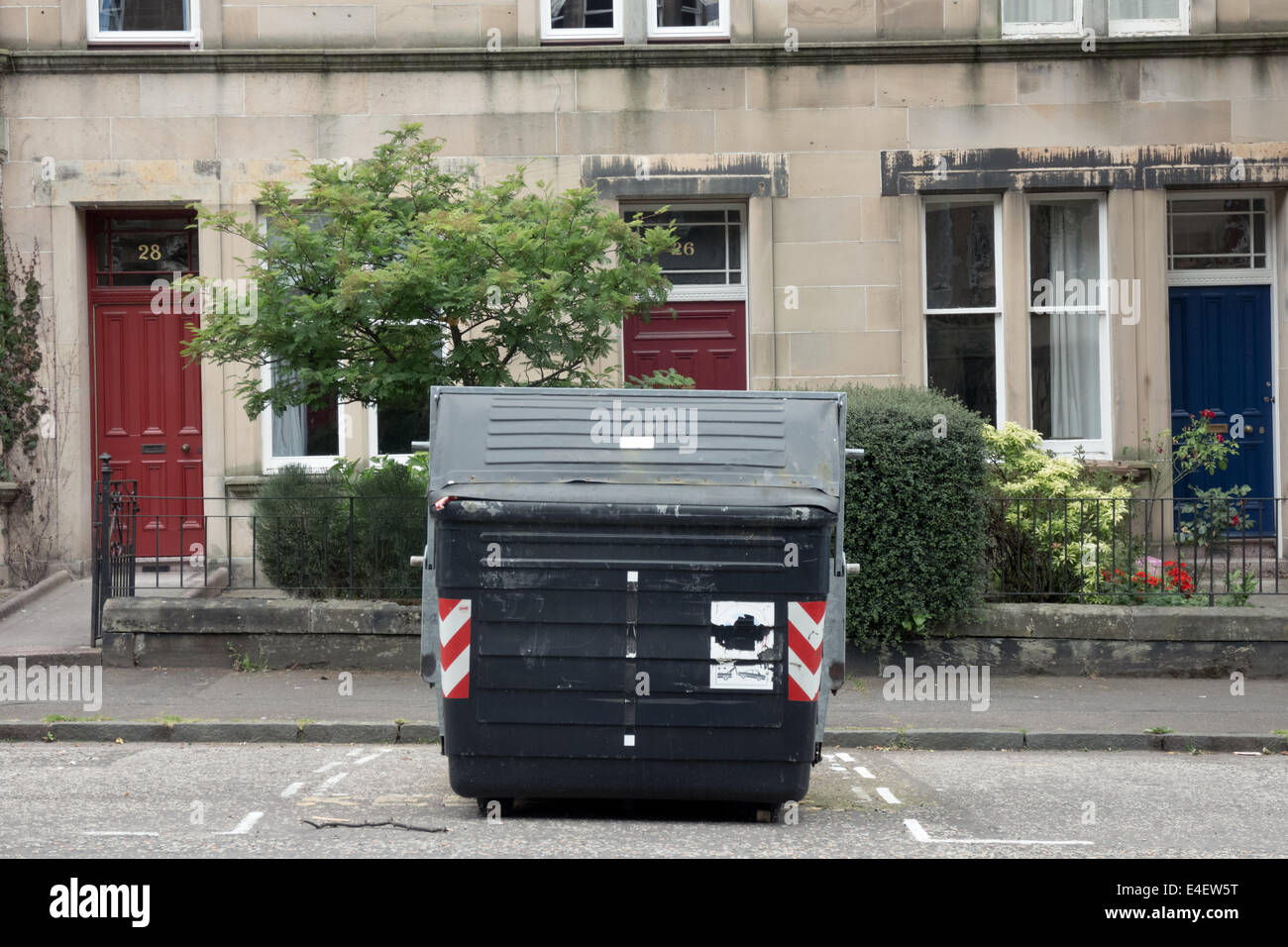 Large public waste bin in front of a building in Marchmont Edinburgh