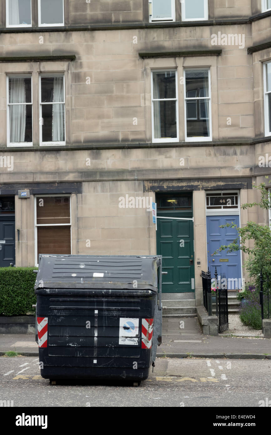 Large public waste bin in front of a building in Marchmont Edinburgh