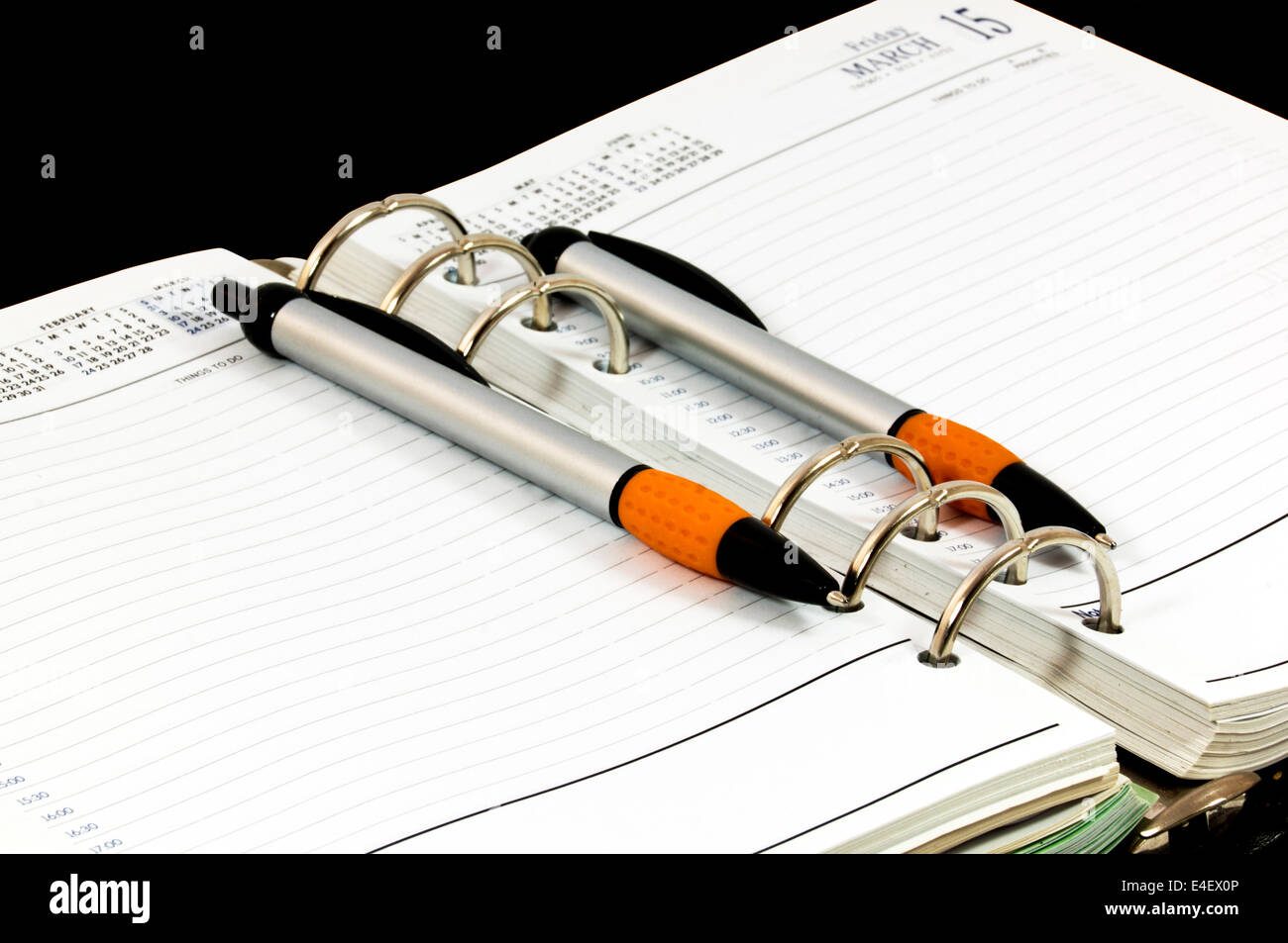 open year planner with two ballpoint pens Stock Photo Alamy