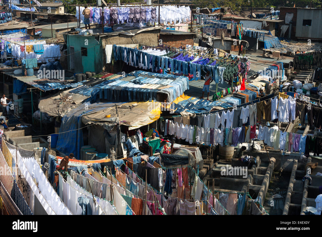 Clean laundry drying up in Mahalaxmi Dhobi ghat, large open air laundry in Mumbai, India. Stock Photo